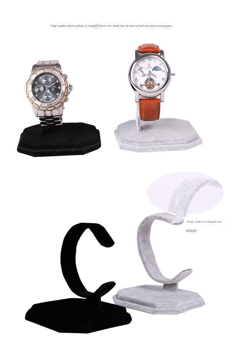 Close-up of C-shaped display stand for jewellery