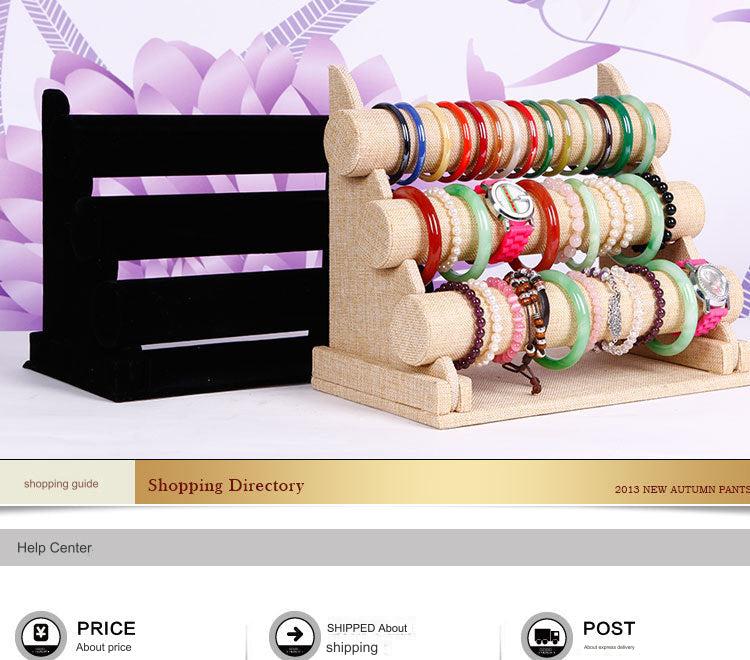 Stylish triple-layer display stand showcasing accessories