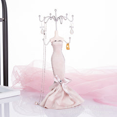 Iron rack holding beautiful earrings and necklaces