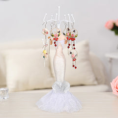 Jewellery stand showcasing necklaces and earrings