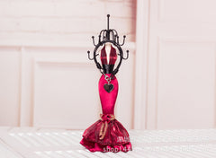 Iron jewellery display rack featuring multiple pieces