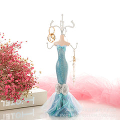 Unique display stand for necklaces and rings