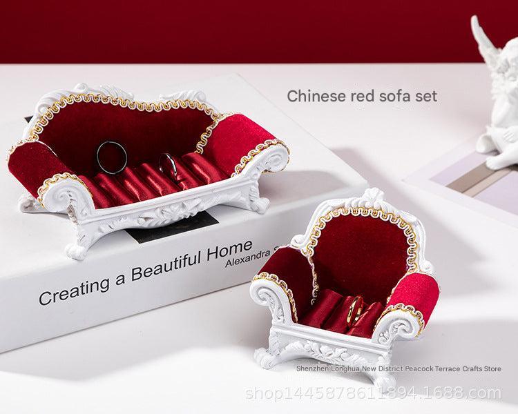 Functional compartments in jewellery storage sofa