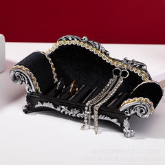 Sofa-shaped jewelry organiser showcasing elegant design