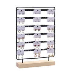 Side View of Wooden and Iron Earring Display