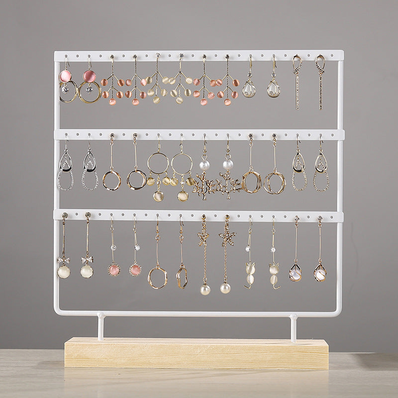 Side View of Wooden and Iron Earring Display