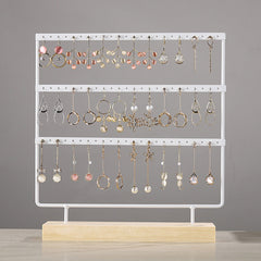 Side View of Wooden and Iron Earring Display