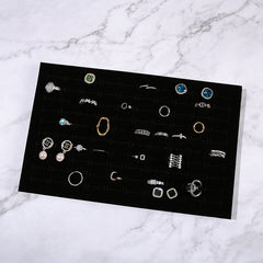 Interior view of adjustable velvet jewelry box compartments