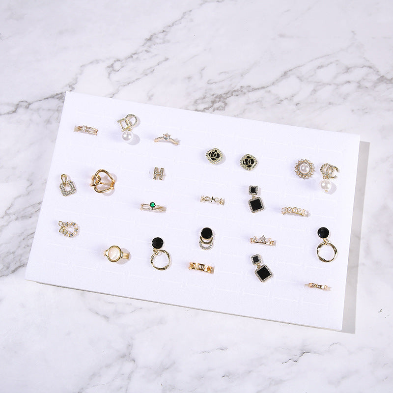 Elegant white velvet jewelry storage box opened