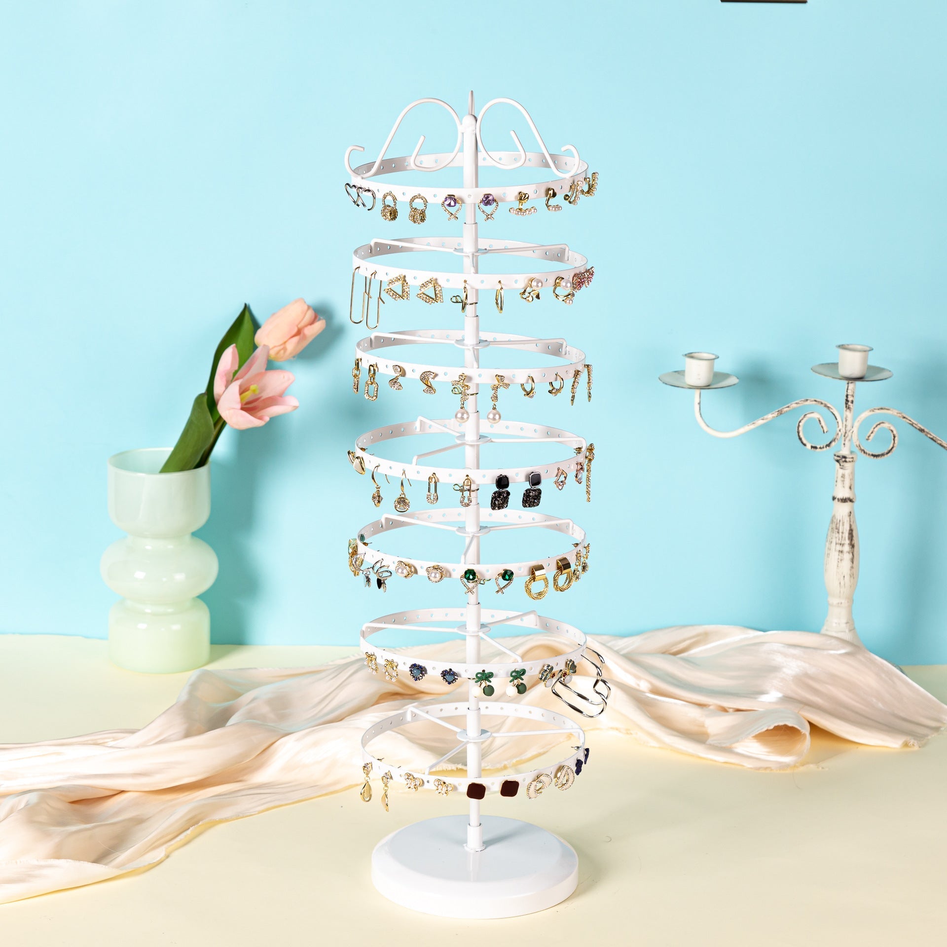 Top view of metal earring display stand with earrings