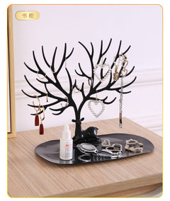 Chic white jewelry organizer holding earrings