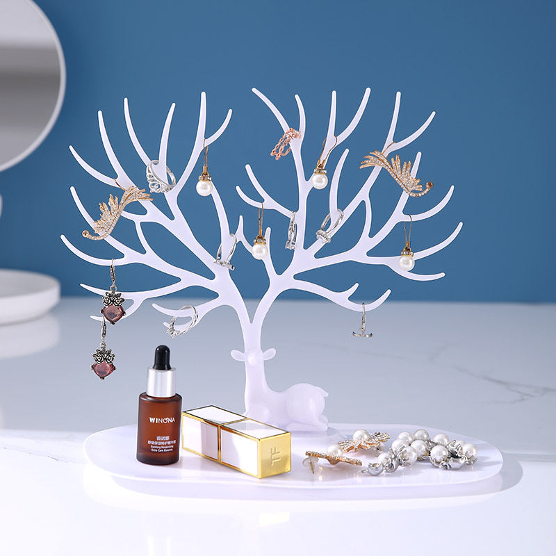 Chic white jewelry organizer holding earrings