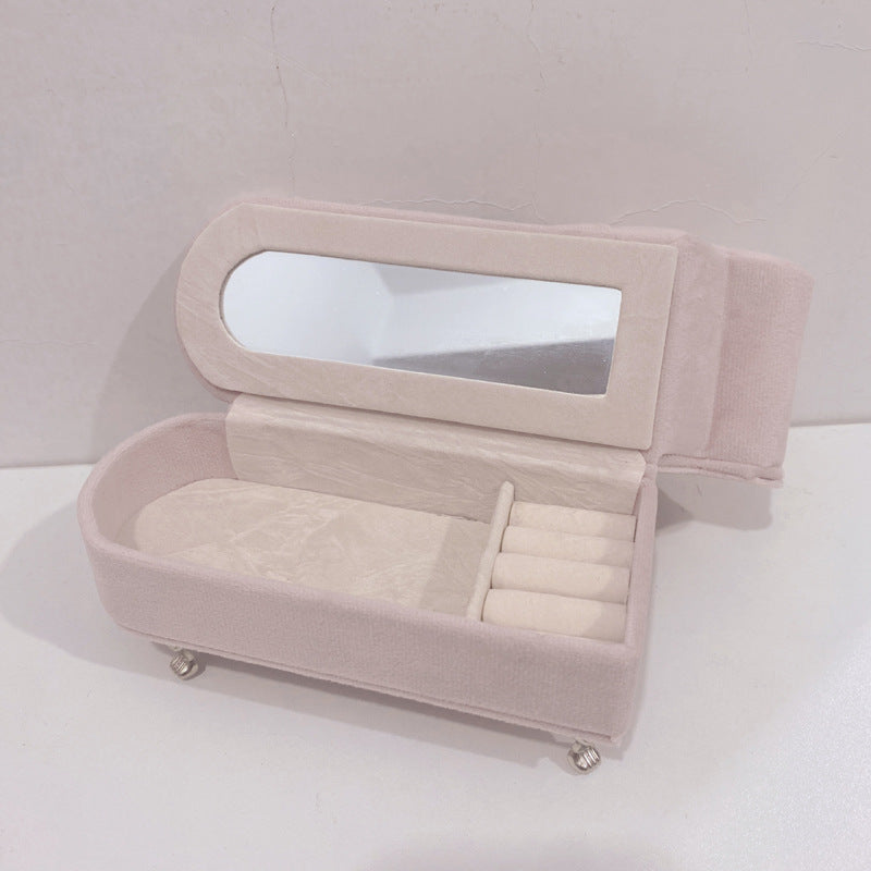 Compact pink velvet vanity for jewellery display