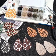 close up of earring parts in storage box