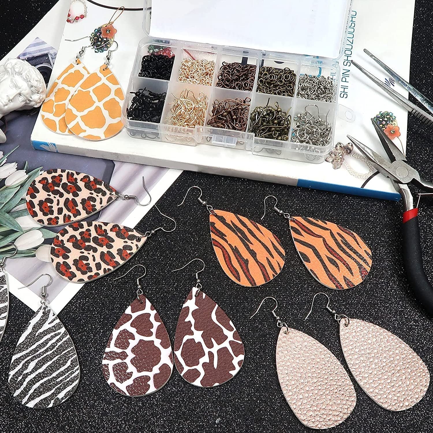 close up of earring parts in storage box