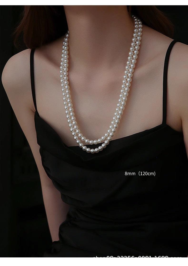 worn long pearl necklace for fashionable look