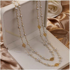 Stylish Pearl Necklace on display