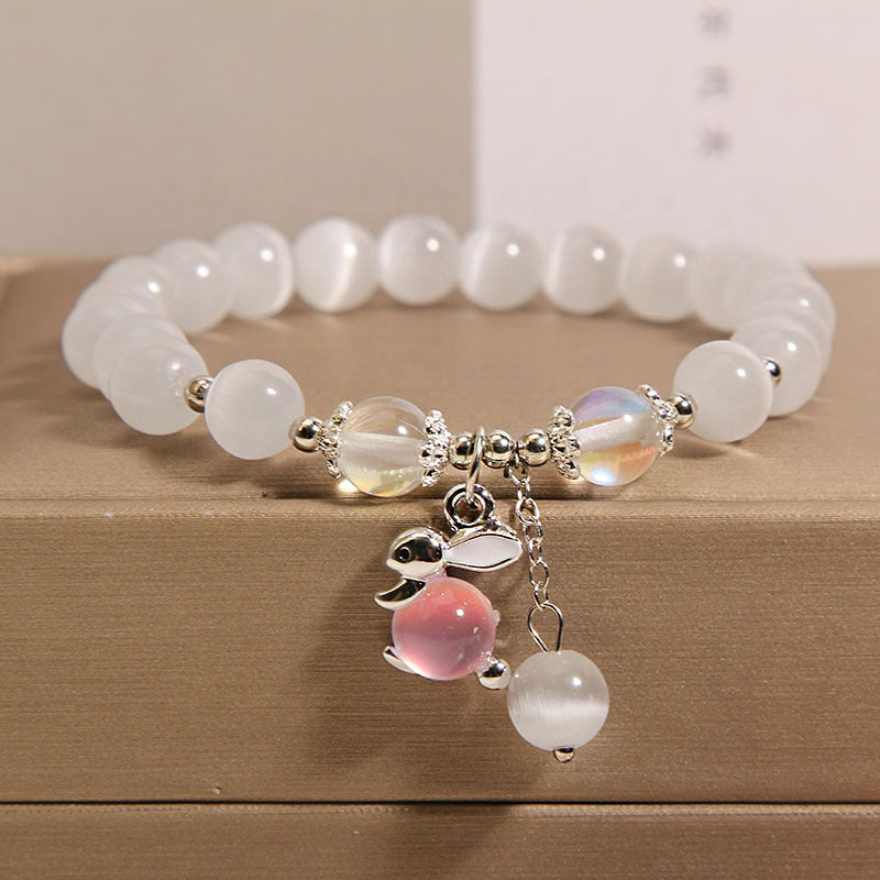 Elegant Cat's Eye Beaded Bracelet featuring clover charm