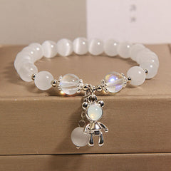 Casual outfit with cat's eye charm bracelet