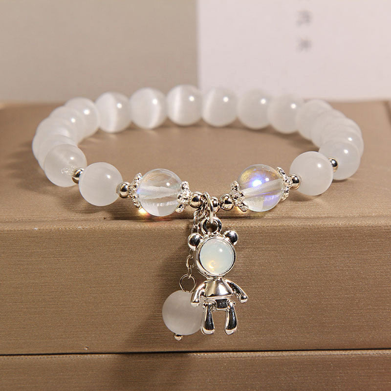 Casual outfit with cat's eye charm bracelet
