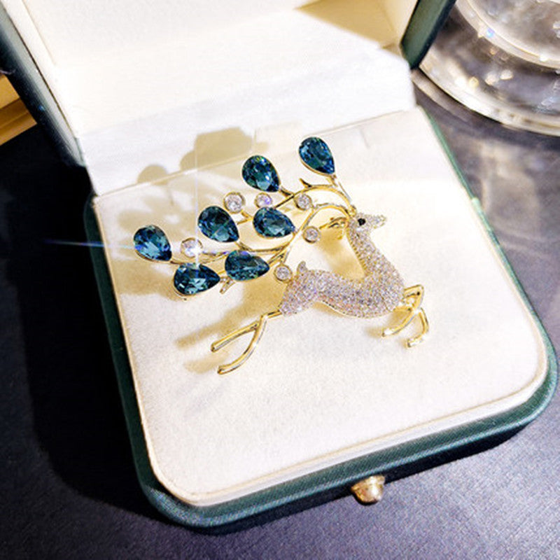 Close-up of the blue crystal brooch design