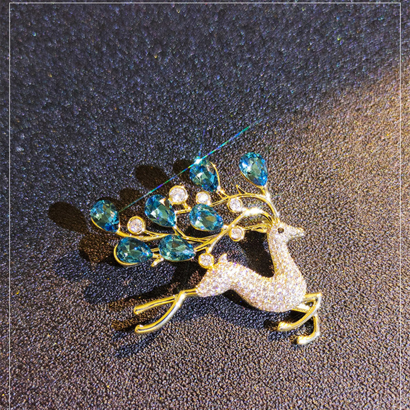 Electroplated alloy deer brooch detailing