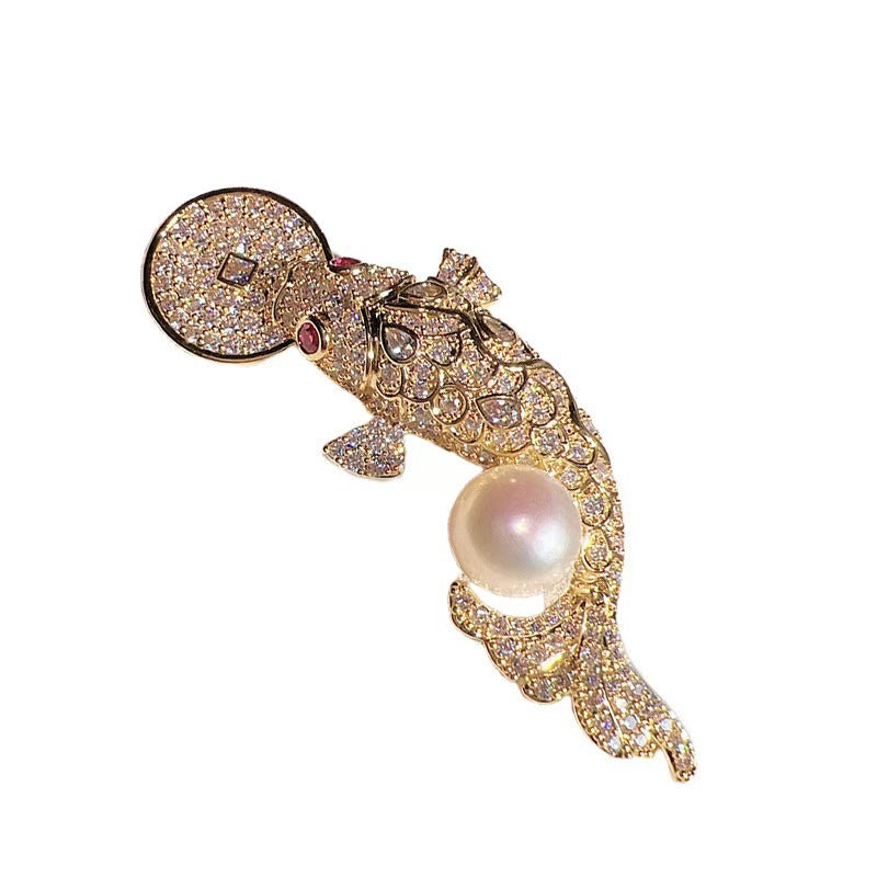Silver Koi Fish Brooch displayed on dress