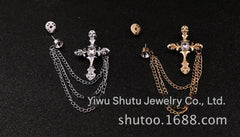 Close-up view of the vintage cross brooch