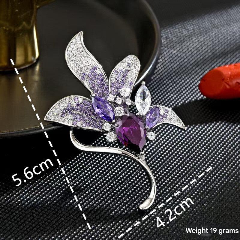 Worn Purple Flower Brooch on a fashionable outfit
