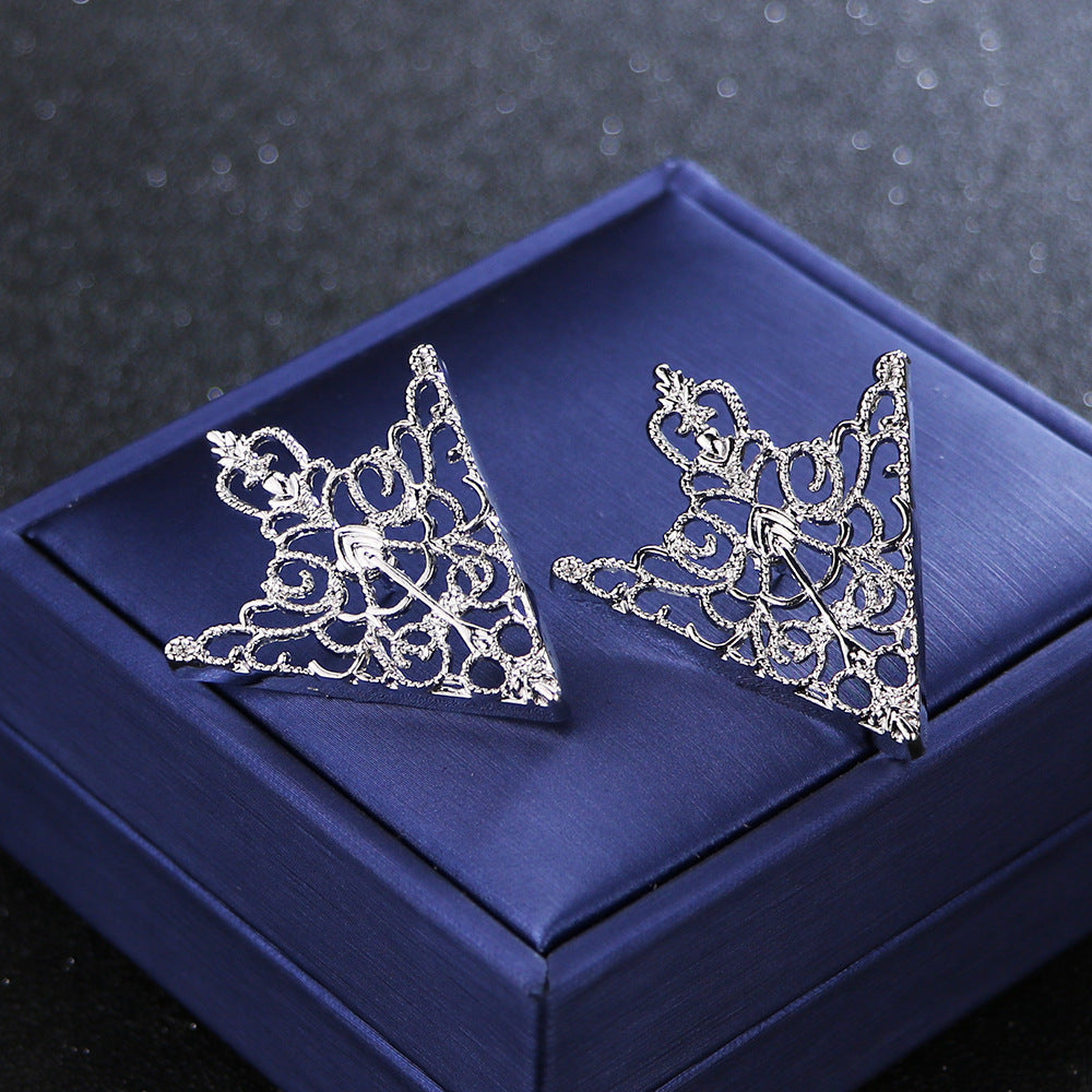 Silver Geometric Lapel Pin on Suit
