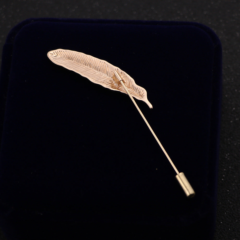Gunmetal feather lapel pin with elegant details