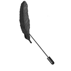 Lapel pin with feather design on a dress shirt