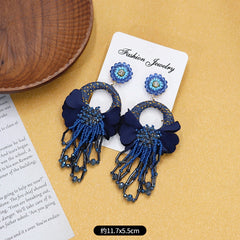 Earrings showcased against elegant decor
