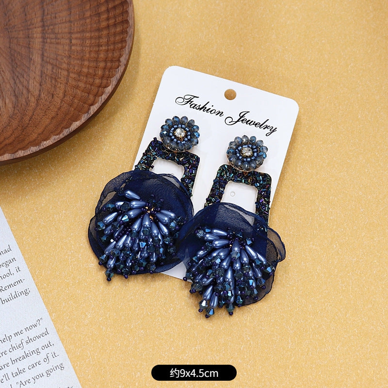 Earrings in stylish display box for retail