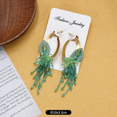 Fashionable earrings featuring tassel elements
