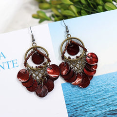 Display of multiple mother-of-pearl earrings