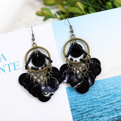 Bohemian earrings styled for an event