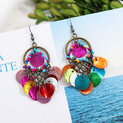 Close up of vintage mother-of-pearl earrings