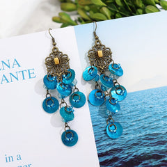 Stylish casual outfit featuring tassel earrings