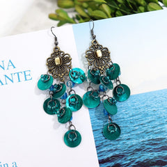 Stylish casual outfit featuring tassel earrings