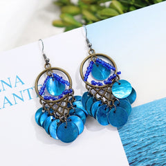 Close up of vintage mother-of-pearl earrings