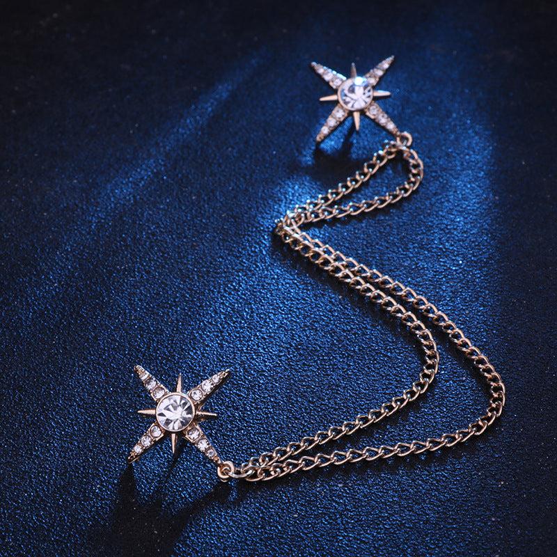 Star-shaped brooch with sparkling crystals