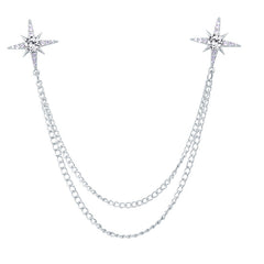 Two-tone gold star brooch featuring crystals