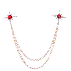 Silver star brooch with white and red crystals