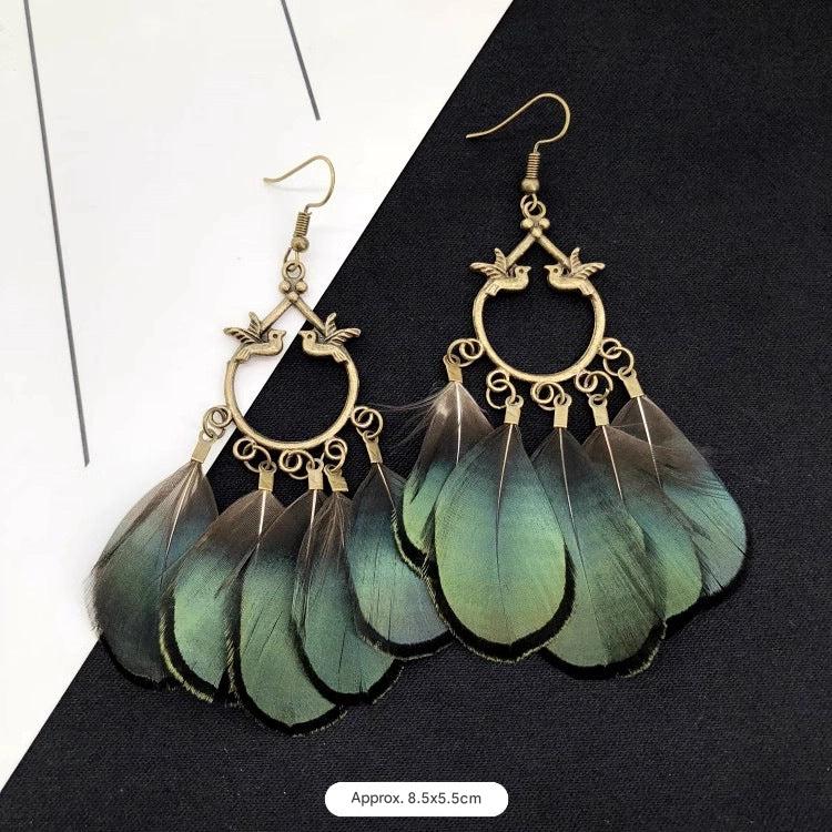 Close-up of bohemian earrings with tassels image 2