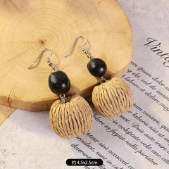 Artisan-crafted rattan earrings in bohemian style