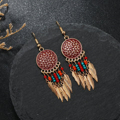 Detailed view of tassel earrings on display