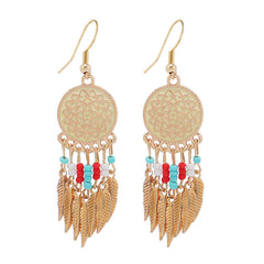 Close-up of the long drop tassel earrings