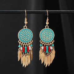 Elegant tassel earrings displayed on a model