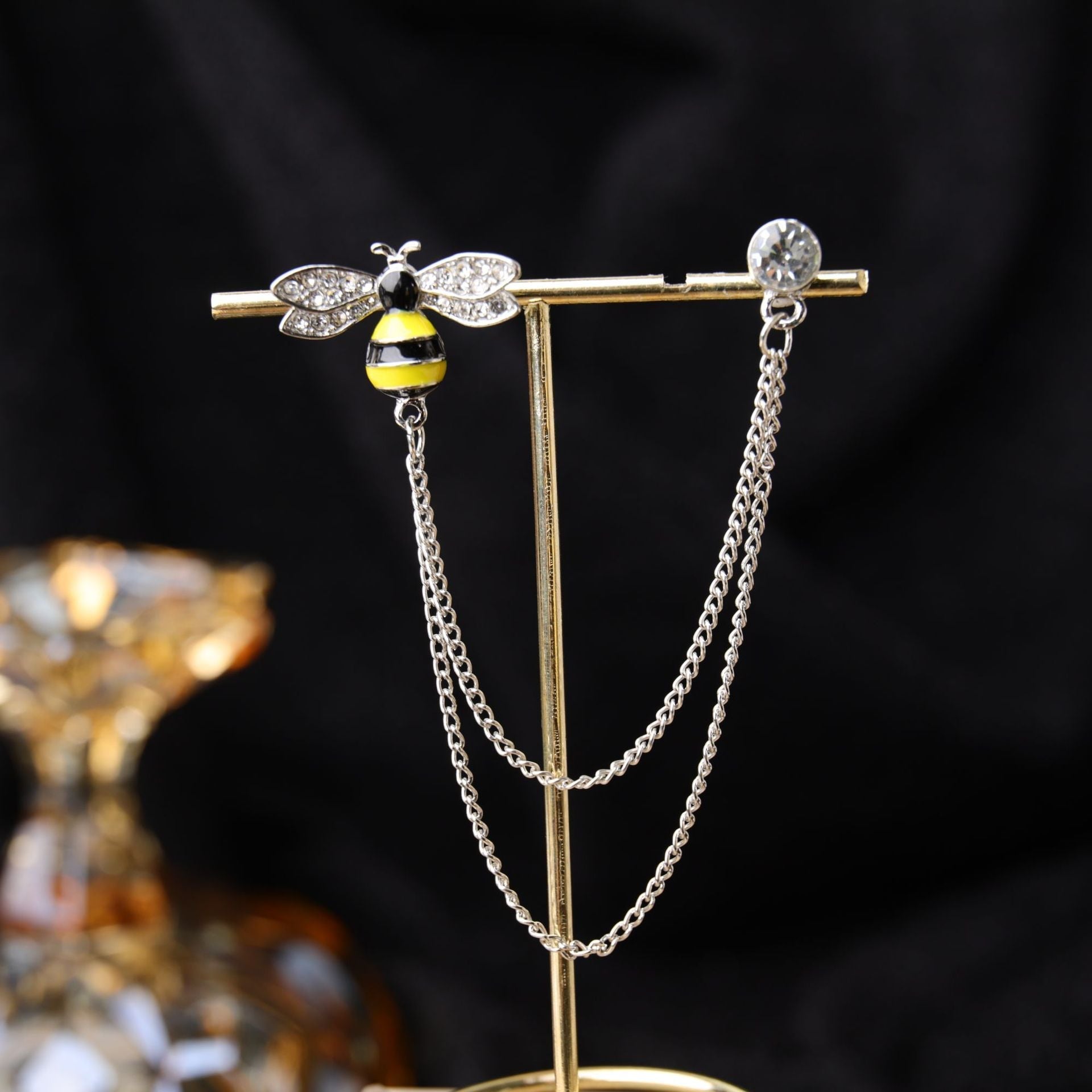 Necklace and brooch set on elegant display